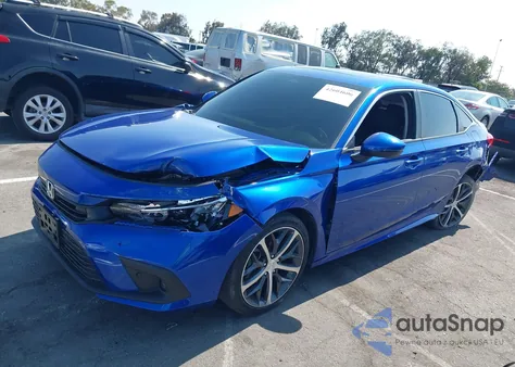 2023 Honda Civic Touring z USA, uszkodzony, nr VIN 2HGFE1F92PH309810